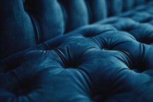 AI generated Blurred dark blue sofa with velor back close up  space for text. photo