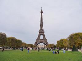 Paris, France. November 30, 2022. Tourist at the Eiffel tower. photo