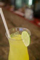 Refreshing cold lemonade with citrus flavor. The concept of summer cocktails on vacation. photo