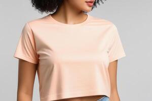 AI generated Woman in peach fuzz colored tshirt, can be used for design, mock up. The trending color of 2024. photo