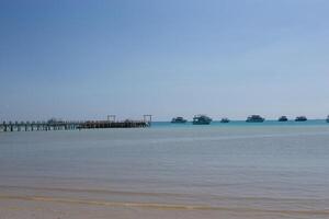 Beach Relaxation at the Red Sea. Fairy-tale Moments of a Sunny Day. The concept of tourism and sea travel photo