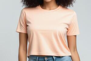 AI generated Woman in peach fuzz colored tshirt, can be used for design, mock up. The trending color of 2024. photo