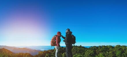 Lover women and men Asian travel nature. Travel relax. Natural Touch countryside. On the Moutain. Thailand photo