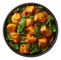 AI generated Spicy chicken tikka masala with spinach in a black bowl on transparent background - stock png. png