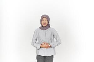 Young Asian woman wearing hijab suffering stomachache, woman period concept isolated on white background photo