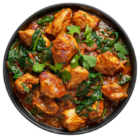 AI generated Spicy chicken tikka masala with spinach in a black bowl on transparent background - stock png. png