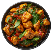 AI generated Spicy chicken tikka masala with spinach in a black bowl on transparent background - stock png. png