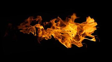 Fire and burning flame of explosive fireball isolated on dark background for graphic design photo