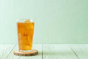 Delicious sweet drink tamarind juice and ice cube photo