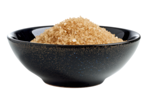 AI generated Organic brown sugar in black bowl on transparent background - stock png. png