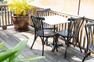 empty table and chair in restaurant photo