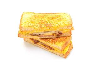 French toast ham bacon cheese sandwich with egg photo