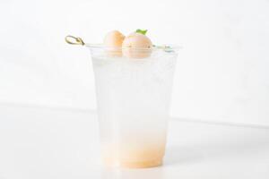 lychee with soda in glass photo