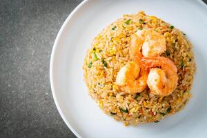 fried shrimps fried rice on plate photo