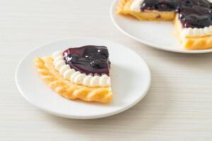 Blueberry Cheese Pie on white plate photo