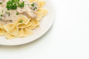 farfalle pasta with mushroom white cream sauce photo