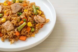 pork fried rice on white plate photo