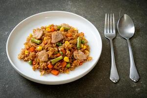 pork fried rice on white plate photo