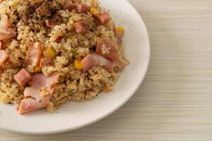 fried rice with bacon ham and black peppers photo