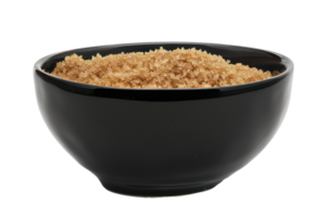 AI generated Organic brown sugar in black bowl on transparent background - stock png. png