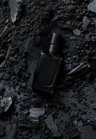 AI generated Elegant Black Perfume Bottle Amidst Dark Shattered Glass Reflecting Luxury and Sophistication photo