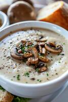 AI generated Savory Cream of Mushroom Soup Served With Fresh Bread and Ingredients photo