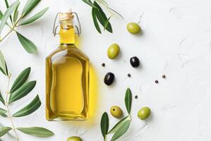 AI generated Olive Oil Bottle Surrounded by Fresh Olives and Green Leaves on a Clean White Background photo