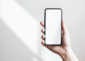 AI generated Person Holding Smartphone With Blank Screen Over Gray Background photo