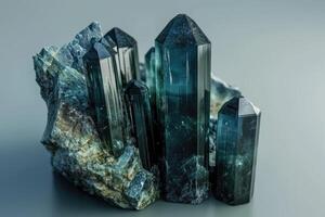 AI generated Blue tourmaline indicolite gem on gray background photo