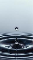 AI generated Water Droplet On Tranquil Surface photo