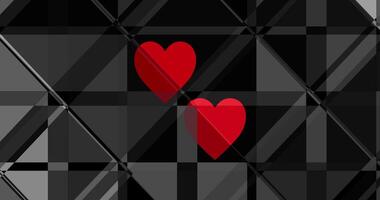 Red hearts on black glass background.Loop red black contrast background video