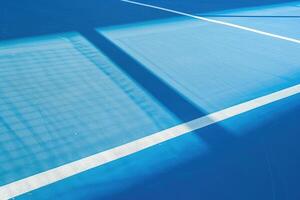 AI generated Blue Sports Court A detail of a colored sports court  lines and shadow photo