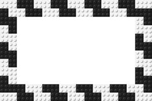 Simple frame composed of two rows of black and white toy blocks. Black and white brick banner. Abstract vector background