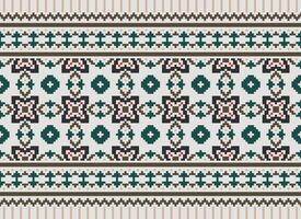Beautiful floral cross stitch pattern.geometric ethnic oriental pattern traditional background.Aztec style abstract vector illustration.design for texture,fabric,clothing,wrapping,decoration,carpet.