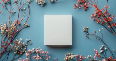 AI generated White Square Box Surrounded by Pink Flowers photo