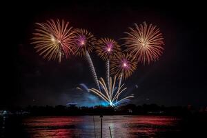 fireworks on the river in the dark sky photo