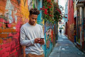 AI generated Young man using smartphone against colorful street art photo