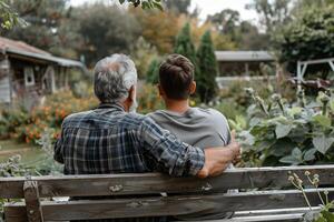 AI generated Affectionate moment between elderly man and young adult in garden photo