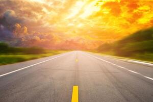 landscape of sunset or sunrise light above asphalt road photo