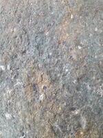 Natural rock texture suitable as graphic design background photo
