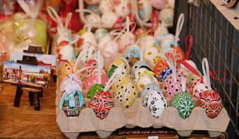 Beautiful colorful decor for Easter. Traditional Easter painted colorful eggs are sold at a market in Prague, Czech Republic. photo