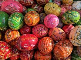 Beautiful colorful decor for Easter. Traditional Easter painted colorful eggs. Selective focus. photo