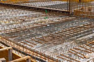 construction site with a lot of metal bars and wires photo