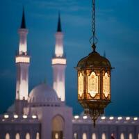 AI generated Traditional lantern glows against mosque backdrop, celebrating Eid festivities For Social Media Post Size photo