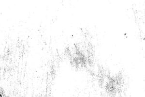 Abstract dusty and grungy scratch texture material or surface. The particles of charcoal splatted on white background. black dust particles explode isolated on white background photo