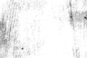 Abstract dusty and grungy scratch texture material or surface. The particles of charcoal splatted on white background. black dust particles explode isolated on white background photo