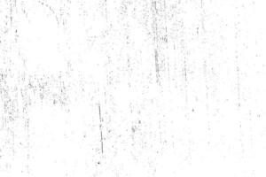 Abstract dusty and grungy scratch texture material or surface. The particles of charcoal splatted on white background. black dust particles explode isolated on white background photo