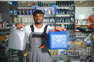 Smiling african Salesman Auto Parts Store photo