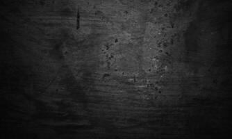 negro hormigón textura como un concepto de horror y Víspera de Todos los Santos. oscuro pared antecedentes cemento o Roca. foto