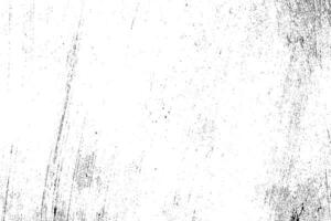 Abstract dusty and grungy scratch texture material or surface. The particles of charcoal splatted on white background. black dust particles explode isolated on white background photo